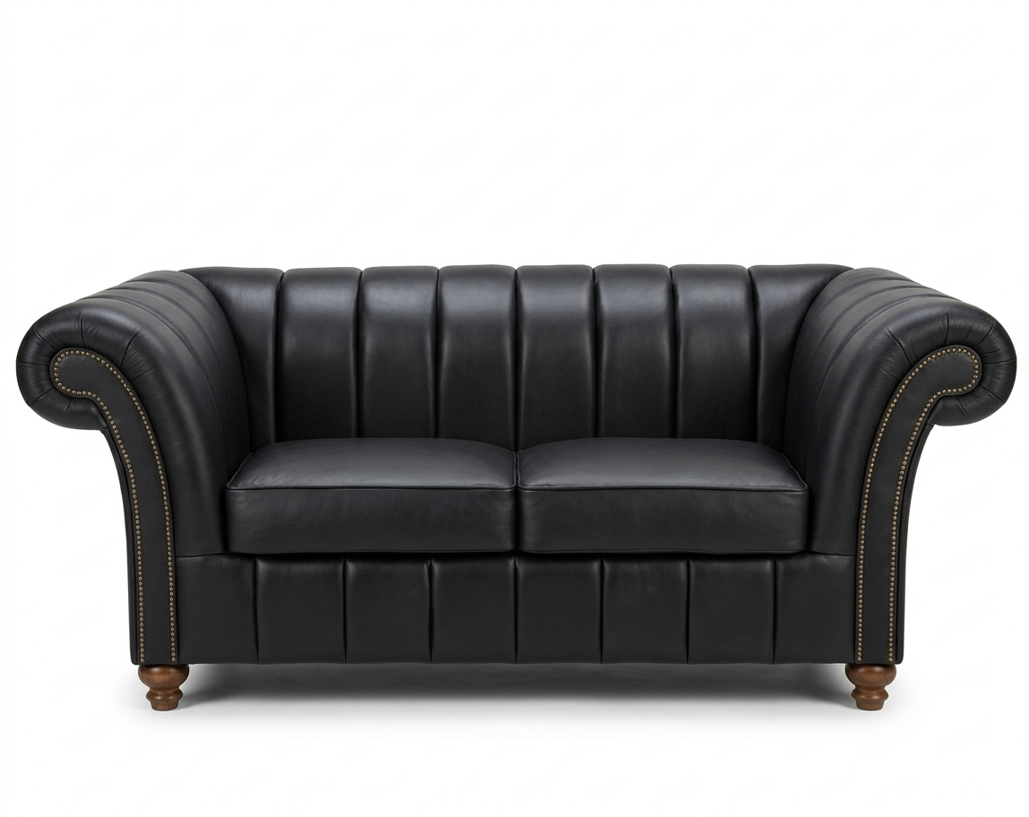 Black leather sofa on a white background