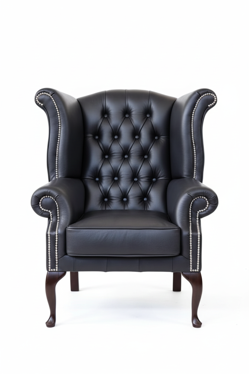 Black leather armchair with buttoned backrest in a furniture store setting